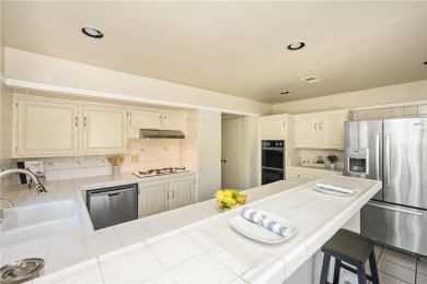 Welcome to this spacious 4-bedroom, 3-bathroom pool and spa home on Los Coyotes Country Club in California - for sale on GolfHomes.com, golf home, golf lot