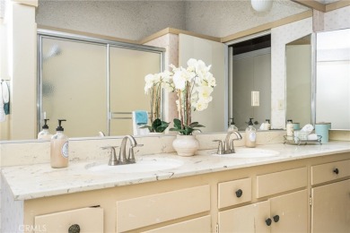 Welcome to this spacious 4-bedroom, 3-bathroom pool and spa home on Los Coyotes Country Club in California - for sale on GolfHomes.com, golf home, golf lot
