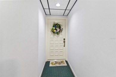 Welcome to a home with a happy atmosphere and abundant sunshine! on Isla Del Sol Yacht and Country Club in Florida - for sale on GolfHomes.com, golf home, golf lot