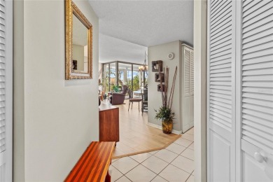 Welcome to a home with a happy atmosphere and abundant sunshine! on Isla Del Sol Yacht and Country Club in Florida - for sale on GolfHomes.com, golf home, golf lot