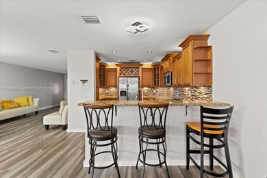 Welcome to refined living in the heart of Sienna Greens.
This on Inverrary Country Club in Florida - for sale on GolfHomes.com, golf home, golf lot