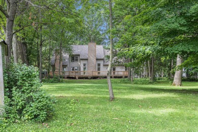 Beautiful setting on just under an acre of a private wooded lot on Inverness Country Club in Michigan - for sale on GolfHomes.com, golf home, golf lot