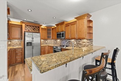 Welcome to refined living in the heart of Sienna Greens.
This on Inverrary Country Club in Florida - for sale on GolfHomes.com, golf home, golf lot