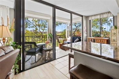 Welcome to a home with a happy atmosphere and abundant sunshine! on Isla Del Sol Yacht and Country Club in Florida - for sale on GolfHomes.com, golf home, golf lot
