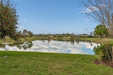OPERETTA MODEL WITH EXPANSIVE WATER & GOLF COURSE VIEWS! Located on Poinciana Golf Club in Florida - for sale on GolfHomes.com, golf home, golf lot