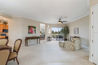 OPERETTA MODEL WITH EXPANSIVE WATER & GOLF COURSE VIEWS! Located on Poinciana Golf Club in Florida - for sale on GolfHomes.com, golf home, golf lot