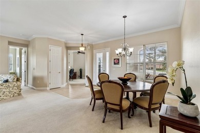 OPERETTA MODEL WITH EXPANSIVE WATER & GOLF COURSE VIEWS! Located on Poinciana Golf Club in Florida - for sale on GolfHomes.com, golf home, golf lot