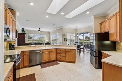 OPERETTA MODEL WITH EXPANSIVE WATER & GOLF COURSE VIEWS! Located on Poinciana Golf Club in Florida - for sale on GolfHomes.com, golf home, golf lot