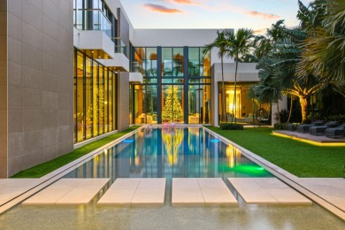 In a league of its own, this architectural masterpiece in on The Club At Admirals Cove Golf Village in Florida - for sale on GolfHomes.com, golf home, golf lot