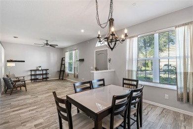 Enjoy serene preserve and golf course views in this elegant on River Strand Golf and Country Club At Heritage Harbour  in Florida - for sale on GolfHomes.com, golf home, golf lot