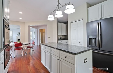 From the moment you arrive, the wrap-around porch invites you to on White Deer Run Golf Club in Illinois - for sale on GolfHomes.com, golf home, golf lot