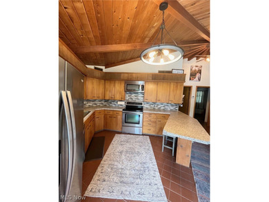 Here is an opportunity to own a *octagon home* built at Lake on Lake Mohawk Golf Club in Ohio - for sale on GolfHomes.com, golf home, golf lot