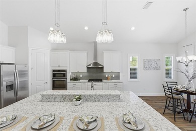 WELCOME HOME to this stunning Canary Model Pool Home located in on Harbor Hills Country Club in Florida - for sale on GolfHomes.com, golf home, golf lot