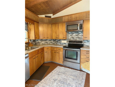 Here is an opportunity to own a *octagon home* built at Lake on Lake Mohawk Golf Club in Ohio - for sale on GolfHomes.com, golf home, golf lot