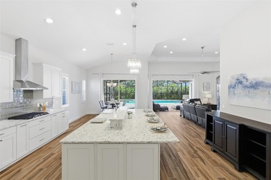 WELCOME HOME to this stunning Canary Model Pool Home located in on Harbor Hills Country Club in Florida - for sale on GolfHomes.com, golf home, golf lot