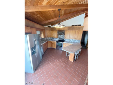 Here is an opportunity to own a *octagon home* built at Lake on Lake Mohawk Golf Club in Ohio - for sale on GolfHomes.com, golf home, golf lot