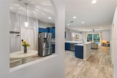 Enjoy serene preserve and golf course views in this elegant on River Strand Golf and Country Club At Heritage Harbour  in Florida - for sale on GolfHomes.com, golf home, golf lot