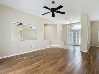 Discover your dream home at 9529 Northcliffe Blvd, Spring Hill on Oak Hills Country Club in Florida - for sale on GolfHomes.com, golf home, golf lot