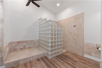 Tucked away on a quiet cul-de-sac in the heart of Bonita Bay on Bonita Bay West in Florida - for sale on GolfHomes.com, golf home, golf lot