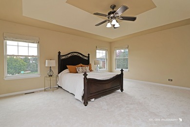 From the moment you arrive, the wrap-around porch invites you to on White Deer Run Golf Club in Illinois - for sale on GolfHomes.com, golf home, golf lot