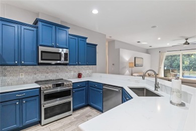 Enjoy serene preserve and golf course views in this elegant on River Strand Golf and Country Club At Heritage Harbour  in Florida - for sale on GolfHomes.com, golf home, golf lot