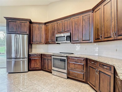 Discover your dream home at 9529 Northcliffe Blvd, Spring Hill on Oak Hills Country Club in Florida - for sale on GolfHomes.com, golf home, golf lot