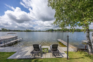 Incredible Main Canadian Lakes waterfront home.  One of the on Canadian Lakes Country Club-The Pines Course in Michigan - for sale on GolfHomes.com, golf home, golf lot