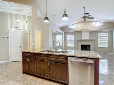 Discover your dream home at 9529 Northcliffe Blvd, Spring Hill on Oak Hills Country Club in Florida - for sale on GolfHomes.com, golf home, golf lot