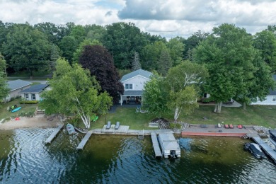 Incredible Main Canadian Lakes waterfront home.  One of the on Canadian Lakes Country Club-The Pines Course in Michigan - for sale on GolfHomes.com, golf home, golf lot