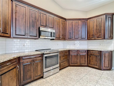 Discover your dream home at 9529 Northcliffe Blvd, Spring Hill on Oak Hills Country Club in Florida - for sale on GolfHomes.com, golf home, golf lot