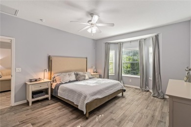 Enjoy serene preserve and golf course views in this elegant on River Strand Golf and Country Club At Heritage Harbour  in Florida - for sale on GolfHomes.com, golf home, golf lot