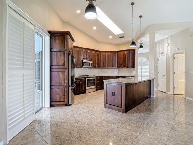 Discover your dream home at 9529 Northcliffe Blvd, Spring Hill on Oak Hills Country Club in Florida - for sale on GolfHomes.com, golf home, golf lot