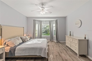 Enjoy serene preserve and golf course views in this elegant on River Strand Golf and Country Club At Heritage Harbour  in Florida - for sale on GolfHomes.com, golf home, golf lot