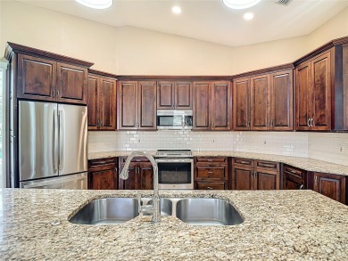 Discover your dream home at 9529 Northcliffe Blvd, Spring Hill on Oak Hills Country Club in Florida - for sale on GolfHomes.com, golf home, golf lot