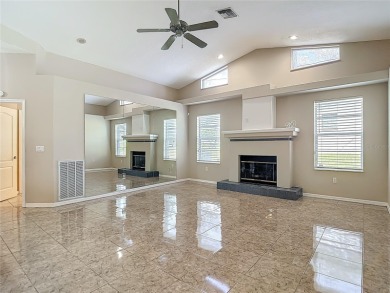Discover your dream home at 9529 Northcliffe Blvd, Spring Hill on Oak Hills Country Club in Florida - for sale on GolfHomes.com, golf home, golf lot