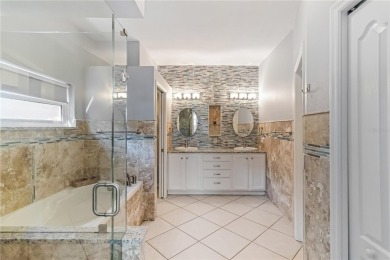 Enjoy serene preserve and golf course views in this elegant on River Strand Golf and Country Club At Heritage Harbour  in Florida - for sale on GolfHomes.com, golf home, golf lot