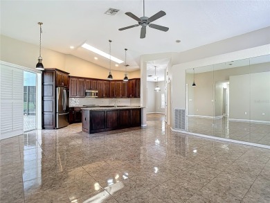 Discover your dream home at 9529 Northcliffe Blvd, Spring Hill on Oak Hills Country Club in Florida - for sale on GolfHomes.com, golf home, golf lot