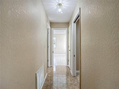 Discover your dream home at 9529 Northcliffe Blvd, Spring Hill on Oak Hills Country Club in Florida - for sale on GolfHomes.com, golf home, golf lot