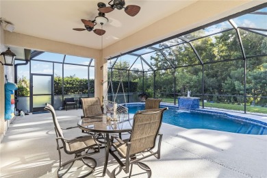 Enjoy serene preserve and golf course views in this elegant on River Strand Golf and Country Club At Heritage Harbour  in Florida - for sale on GolfHomes.com, golf home, golf lot