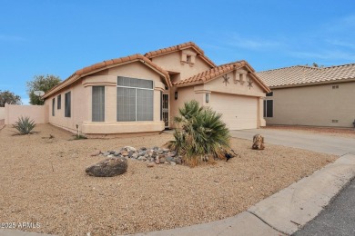 Nestled in a vibrant, active community with scenic golf courses on Coyote Lakes Golf Club in Arizona - for sale on GolfHomes.com, golf home, golf lot