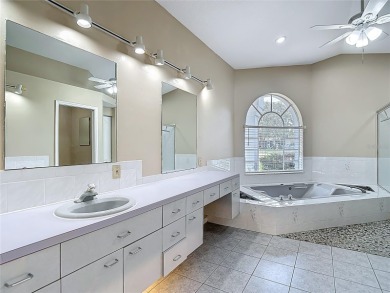 $25,000 PRICE REDUCTION!    Discover your dream home at 9529 on Oak Hills Country Club in Florida - for sale on GolfHomes.com, golf home, golf lot
