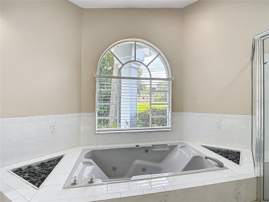 $25,000 PRICE REDUCTION!    Discover your dream home at 9529 on Oak Hills Country Club in Florida - for sale on GolfHomes.com, golf home, golf lot