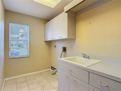 $25,000 PRICE REDUCTION!    Discover your dream home at 9529 on Oak Hills Country Club in Florida - for sale on GolfHomes.com, golf home, golf lot