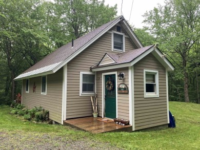 This house sits on a lot that is surrounded by common land so it on Hermitage Club Golf Course in Vermont - for sale on GolfHomes.com, golf home, golf lot