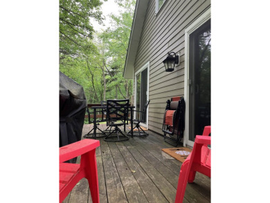 This house sits on a lot that is surrounded by common land so it on Hermitage Club Golf Course in Vermont - for sale on GolfHomes.com, golf home, golf lot
