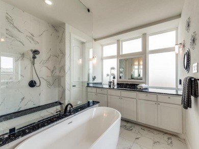 Experience refined living in this impeccably maintained home on The Tribute At the Colony in Texas - for sale on GolfHomes.com, golf home, golf lot