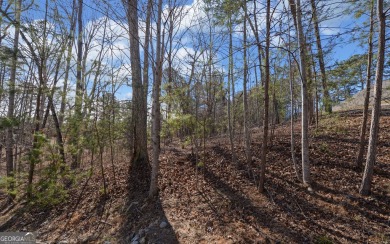 Discover the essence of tranquility on this private cul-de-sac on Currahee Golf Club in Georgia - for sale on GolfHomes.com, golf home, golf lot