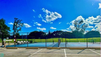 This charming 1 bedroom, 1.5 bathroom residence in Century on Hillsboro Pines Golf in Florida - for sale on GolfHomes.com, golf home, golf lot