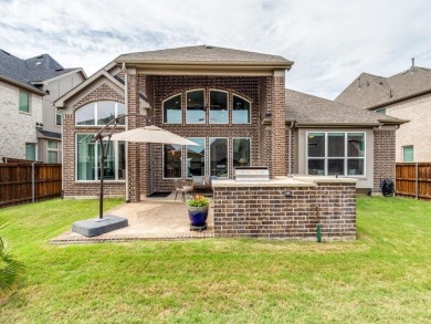 Experience refined living in this impeccably maintained home on The Tribute At the Colony in Texas - for sale on GolfHomes.com, golf home, golf lot