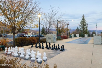 Embrace the charm of alpine living in this elegant second-floor on Homestead Golf Club and Resort in Utah - for sale on GolfHomes.com, golf home, golf lot